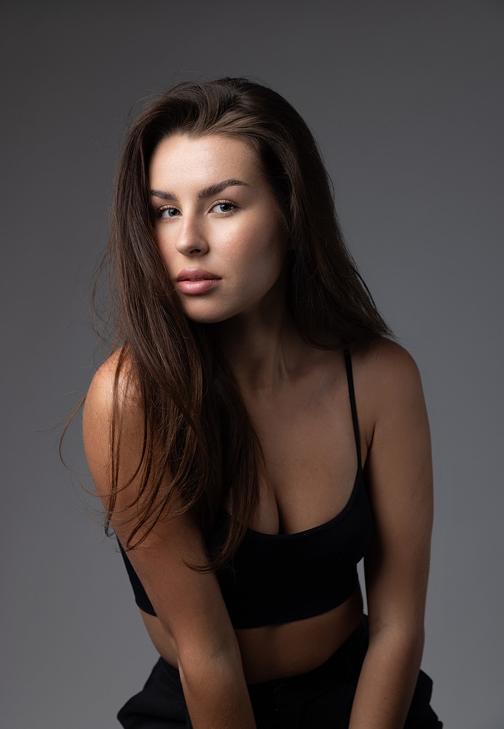 Portrait of a woman with long, flowing hair.